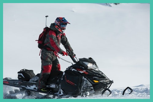 Wisconsin Travel Guide Person Snow Mobiling 